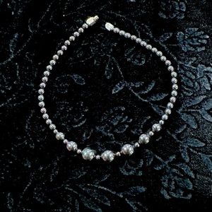 Ankle bracelet with twist closure